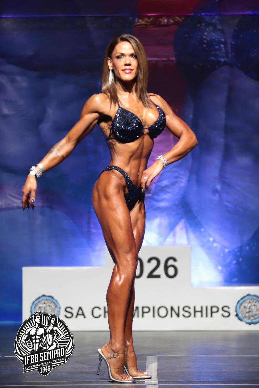 Monica Bingham front pose at the IFBB Semi-Pro SA Championships 2026